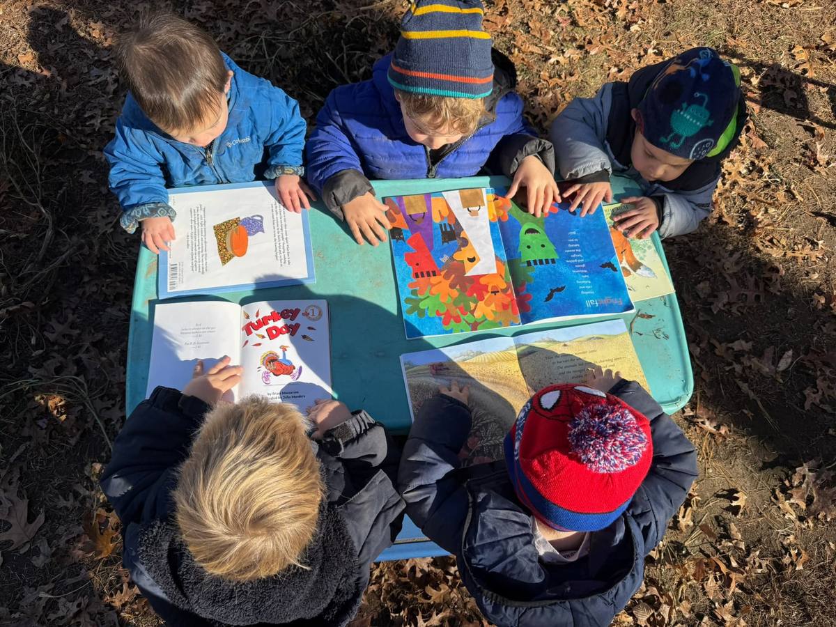 Children reading picture books